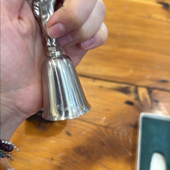 Reed & Barton Silver Bell with Toddler holding a sock - Picture 6 of 7